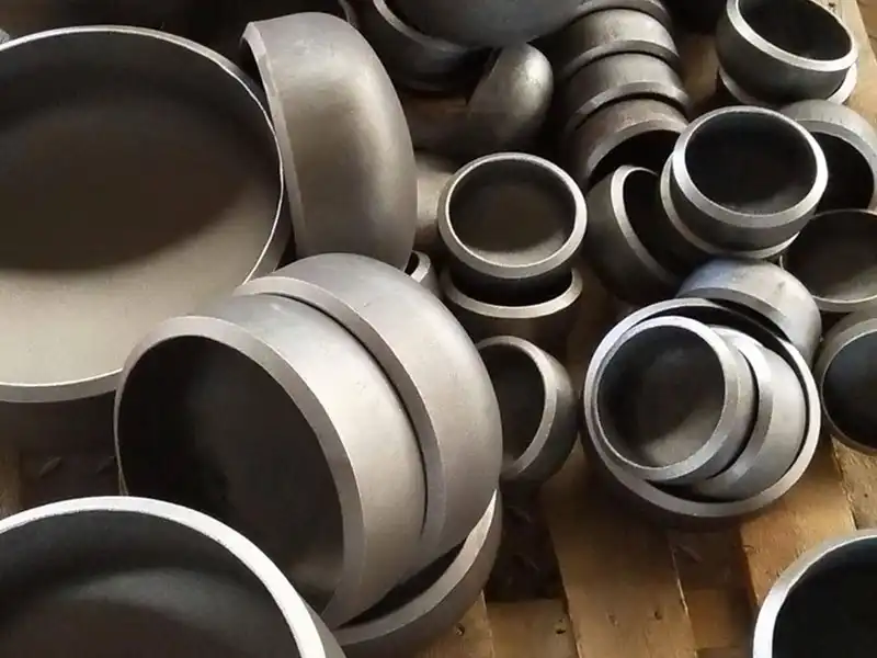 What industries commonly use Buttweld End Cap fittings?